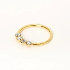 Claire's Bijoux Premium|Bijoux De Piercing-Anneau pour piercing de nez à quatre strass 0,6 mm couleur argentée et couleur dorée