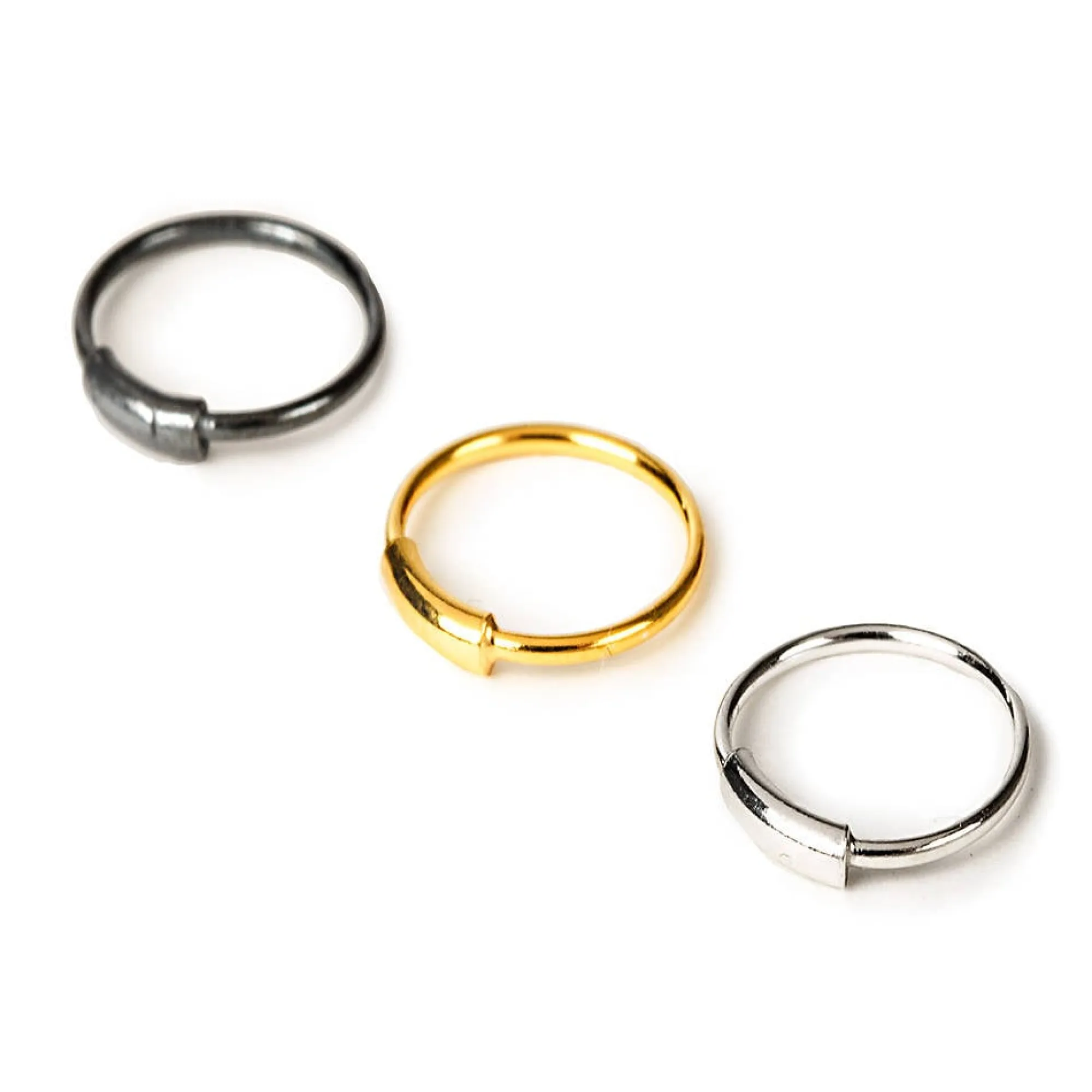 Claire's Bijoux De Piercing-Anneaux de nez avec barre 0,6 mm en métaux mixtes couleur argentée - Lot de 3