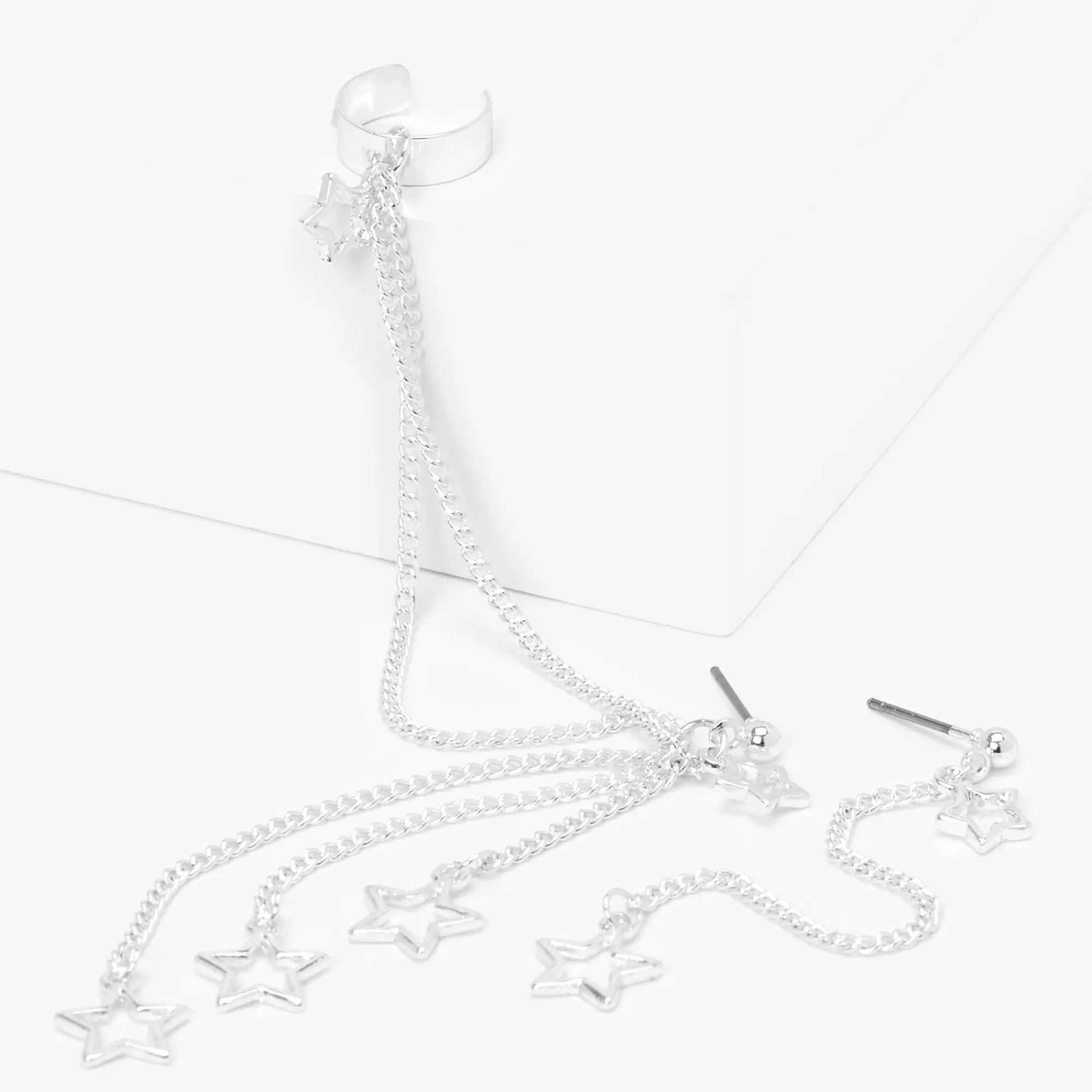 Claire's Anneaux|Pendantes-Boucles d’oreilles reliées par une chaîne à une manchette d’oreille étoile ajourée couleur argentée