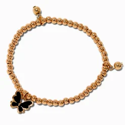 Claire's Bracelets-Bracelet élastique perlé couleur dorée et papillon émaillé noir