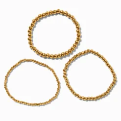 Claire's Bracelets|Bijoux Premium-Bracelets élastiques boule de tailles graduelles en acier inoxydable couleur dorée - Lot de 3