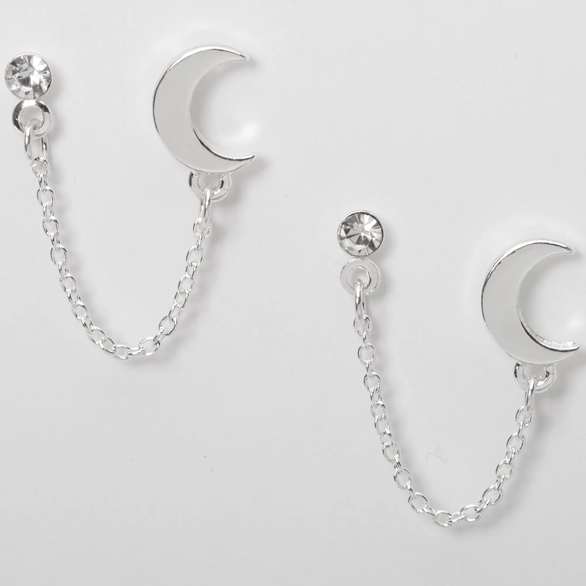Claire's Clous D'oreilles-Clous d'oreilles à chaîne lune ornementée couleur argentée