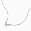 Claire's Colliers-Collier avec mini pendentif nœud couleur argentée